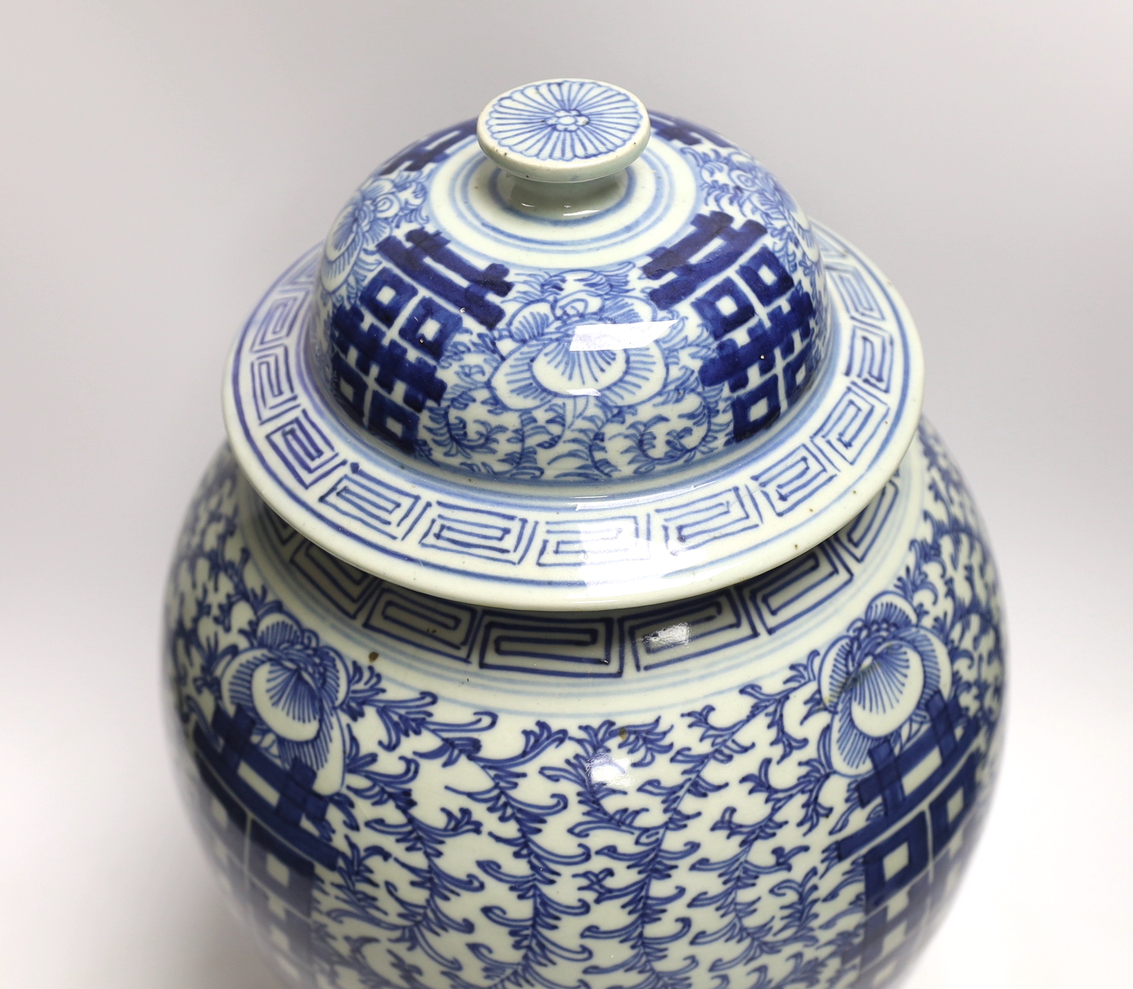 A Chinese blue and white ‘shuangxi’ baluster jar and cover, 43cm high